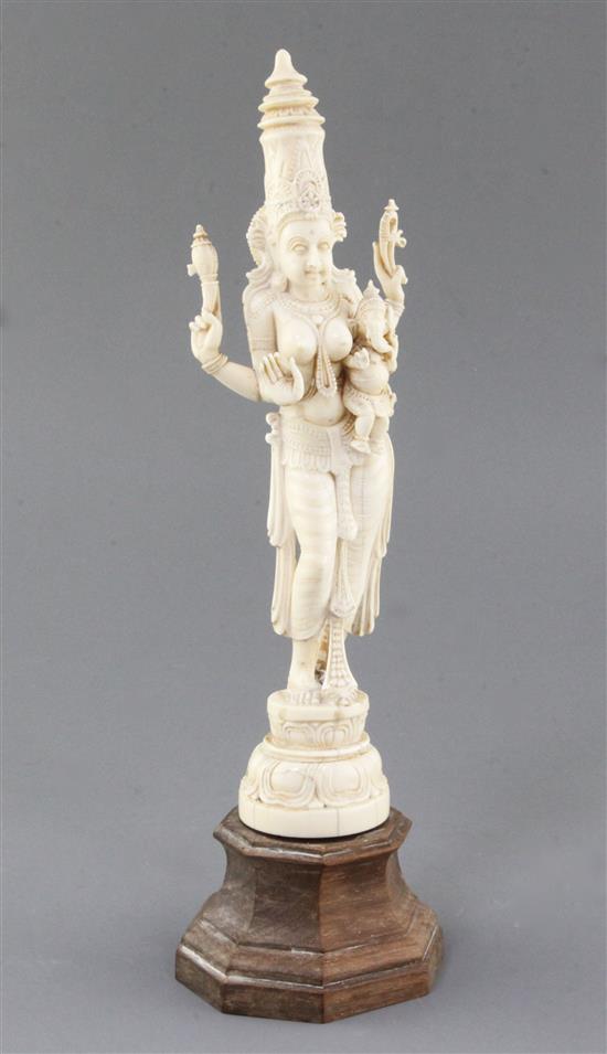 An Indian carved ivory figure of Parvati and Ganesh, c.1900, overall height 30.5cm